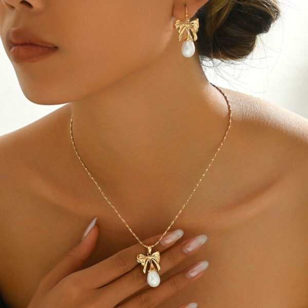 Elegant Gold-Toned Bow & Pearl  Jewelry Set - Necklace & Earrings - Image 4